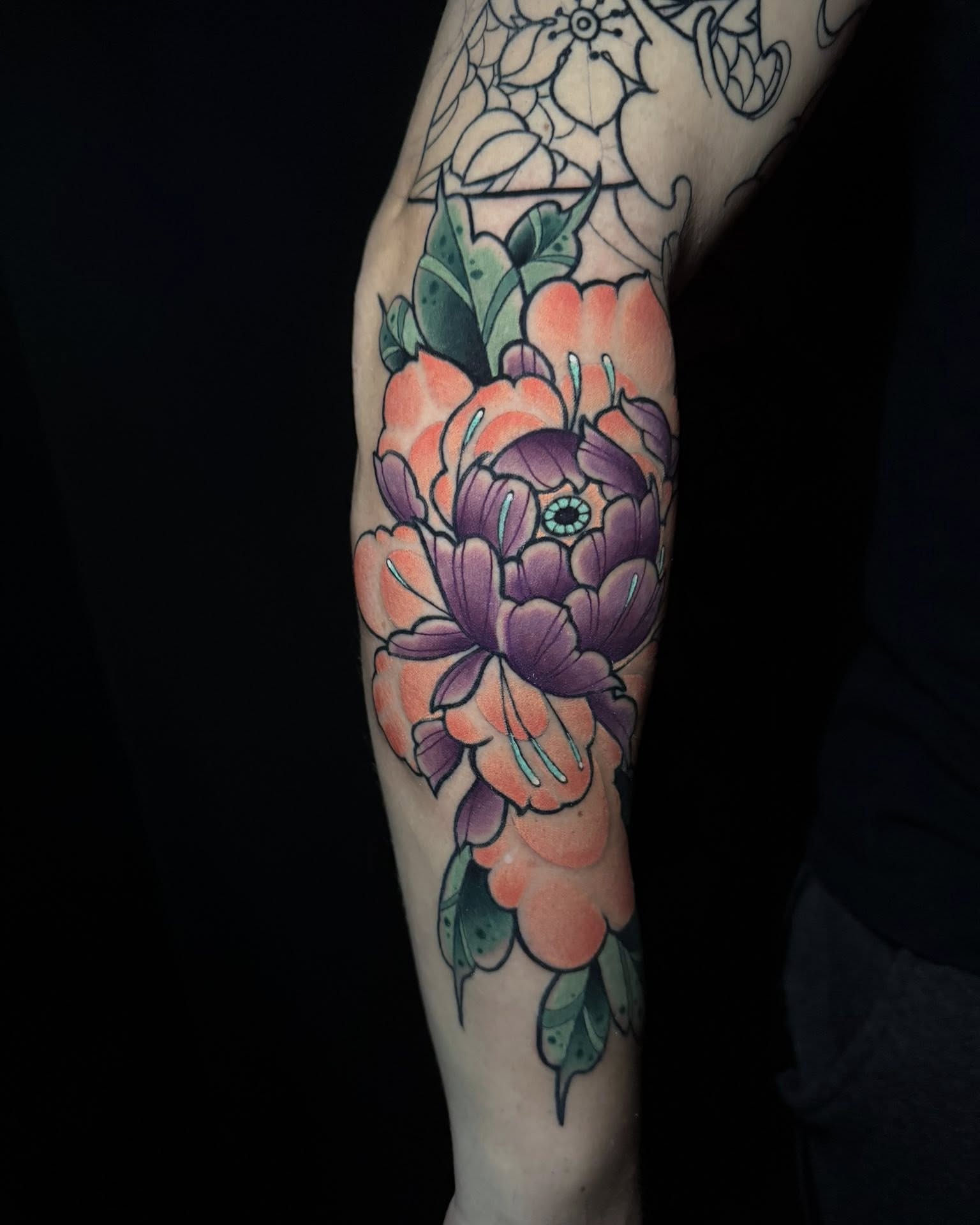Floral bouquet American traditional tattoo on the forearm by taylor mills