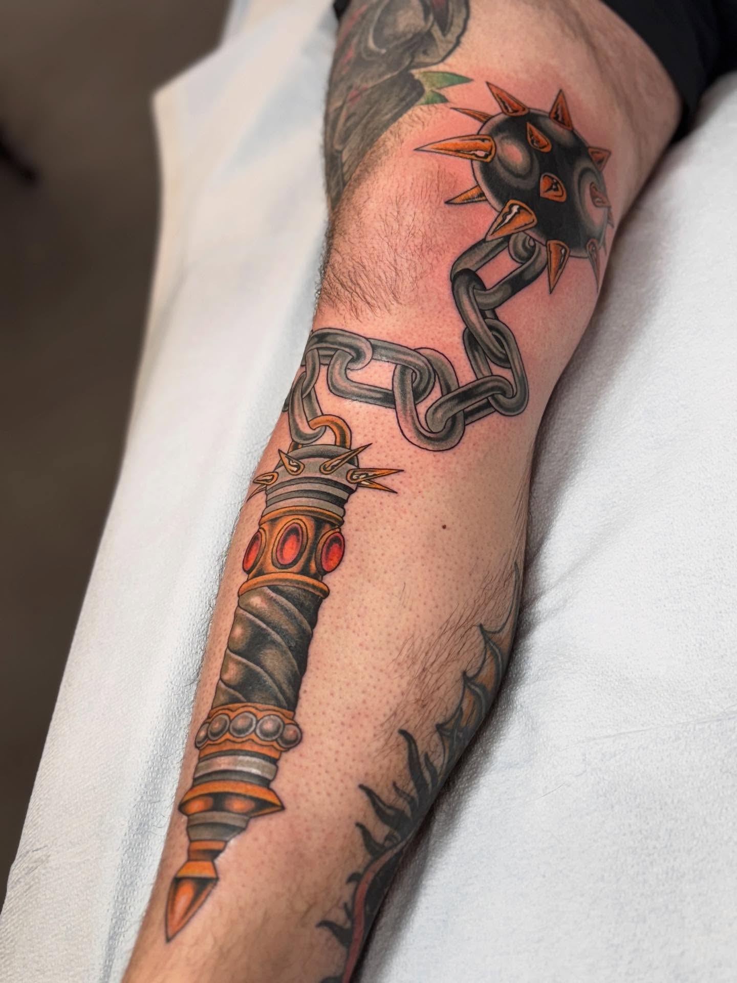 Mech weapon geometric tattoo on the forearm by Cole Pittman Memphis Tattoo artist, Memphis, Tennessee