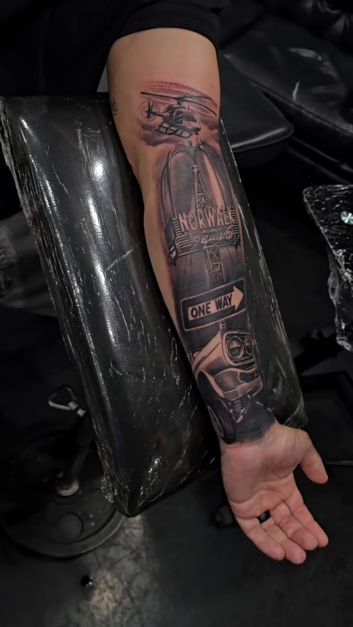 Tombstone and sign realism tattoo by Richie Garcia, Hesperia, California