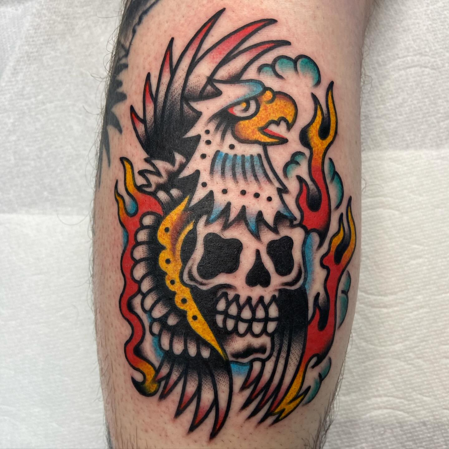 Skull with flames American traditional tattoo on the forearm by Anthony Jaeger, Seattle, Washington