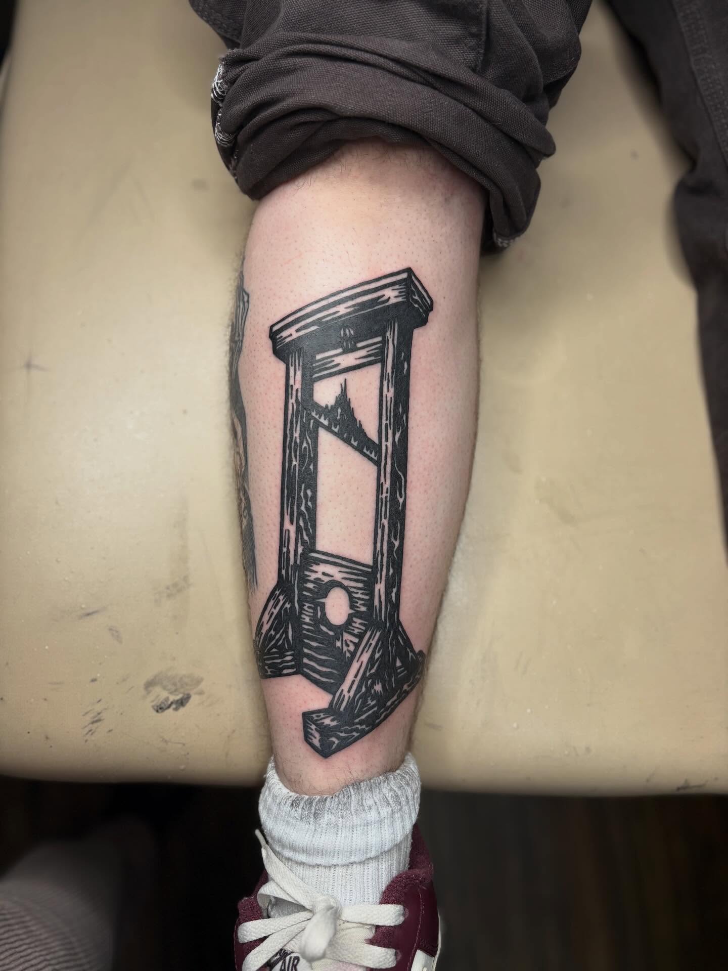 Hourglass black and grey tattoo on the forearm by Lauren Deets