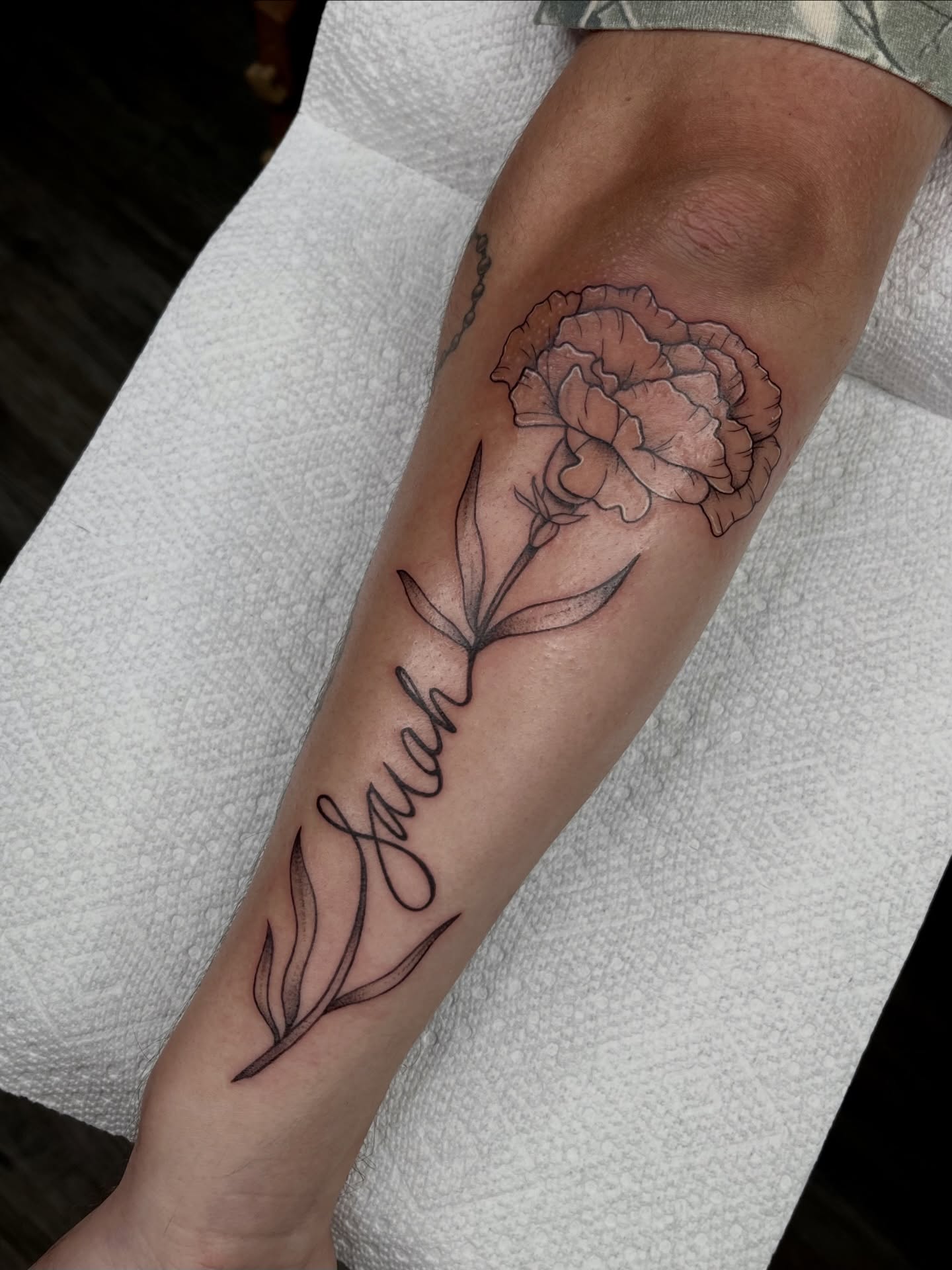 Carnation and name black and grey tattoo on the forearm by ✩gracie ⋆｡°✩