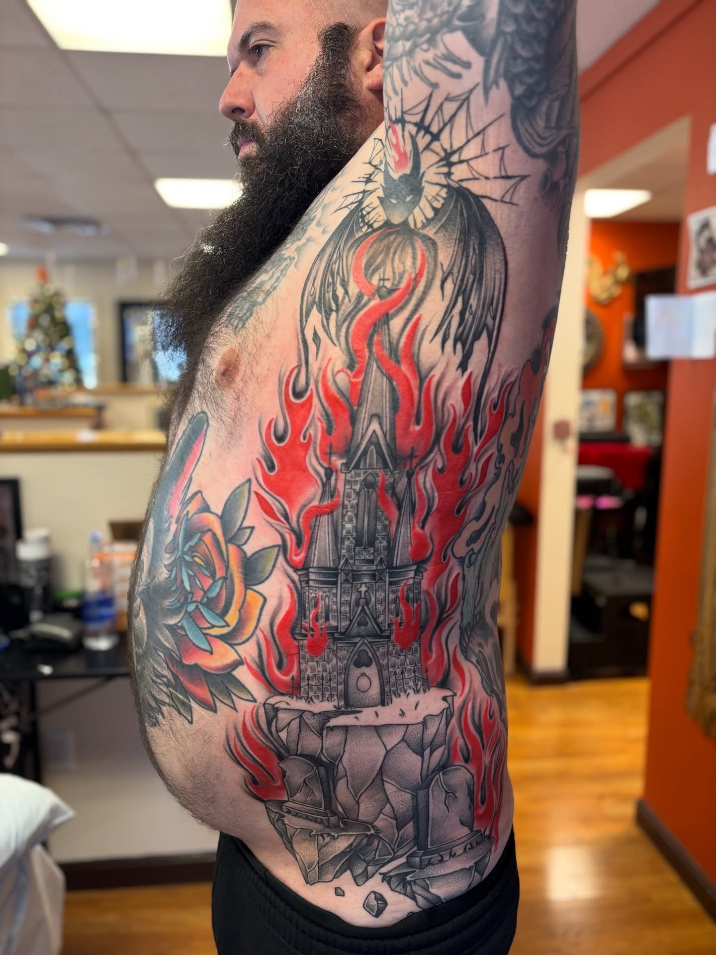 Burning castle neo-traditional tattoo on the torso by Dee - MA Tattoo Artist, Concord, Massachusetts
