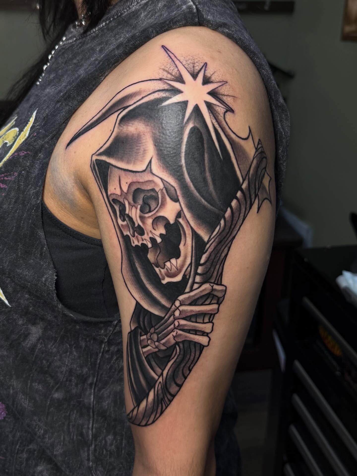 Grim reaper realism tattoo on the shoulder by Eli