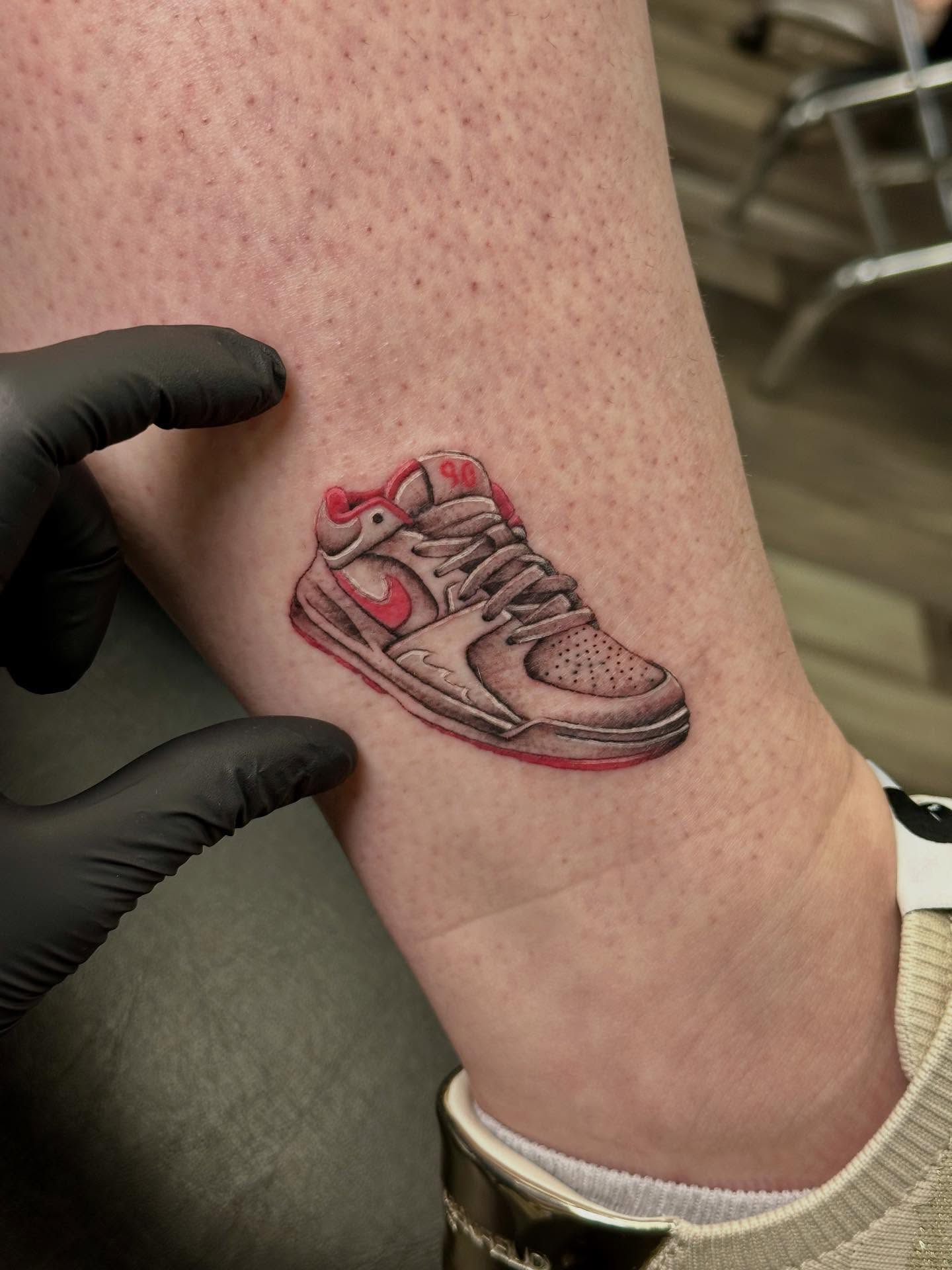 Sneaker realism tattoo on the forearm by Katrina Aldaco 🧿 Tattoo Artist