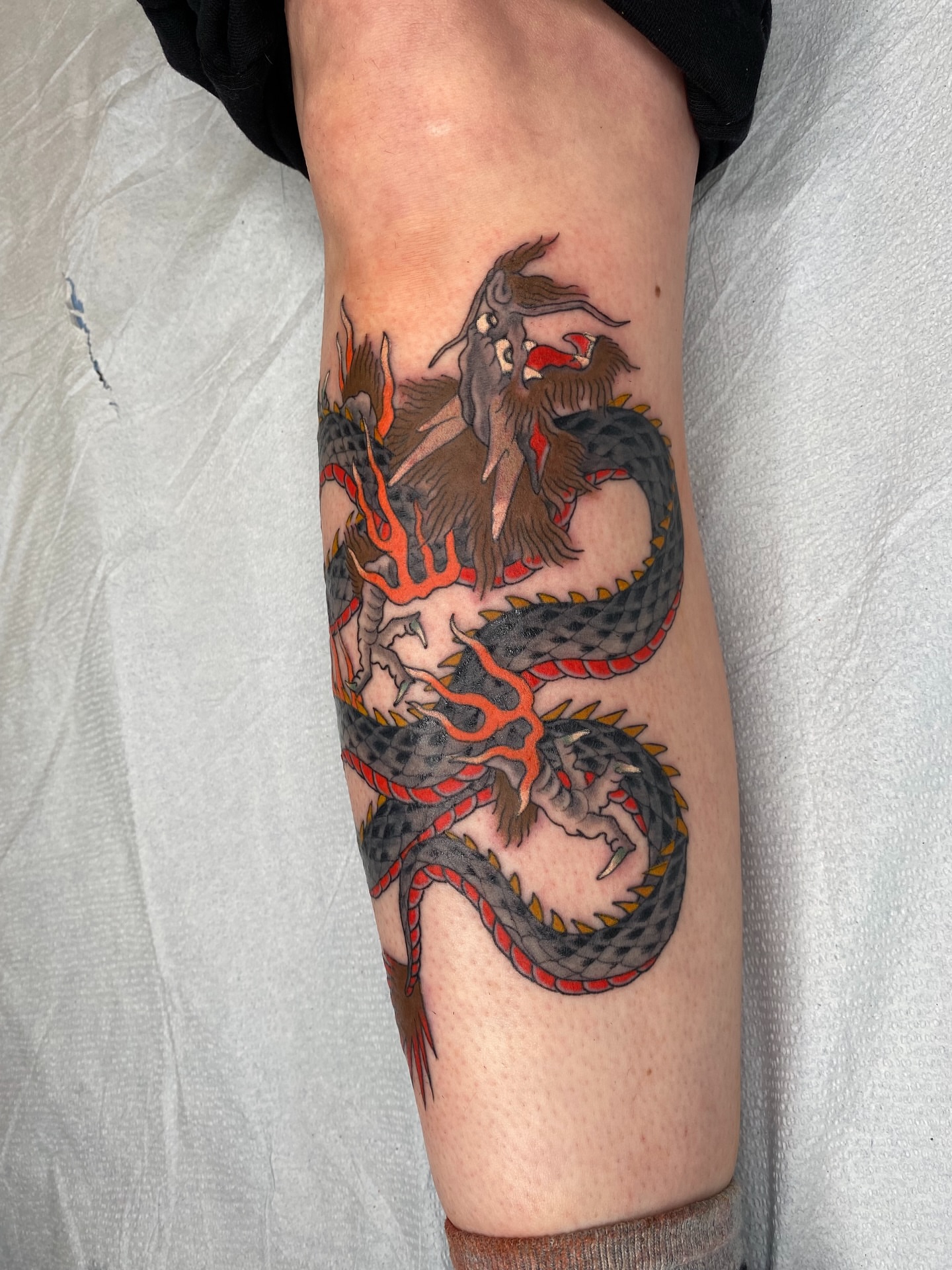 Dragon japanese irezumi tattoo on the forearm by Mike "Yogi" Trube