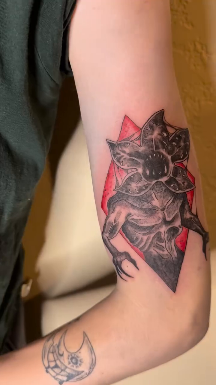 Demogorgon from Stranger Things realism tattoo on the forearm by Danny Garcia