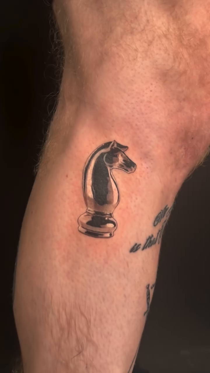 Chess piece realism tattoo by Jerm Lewis