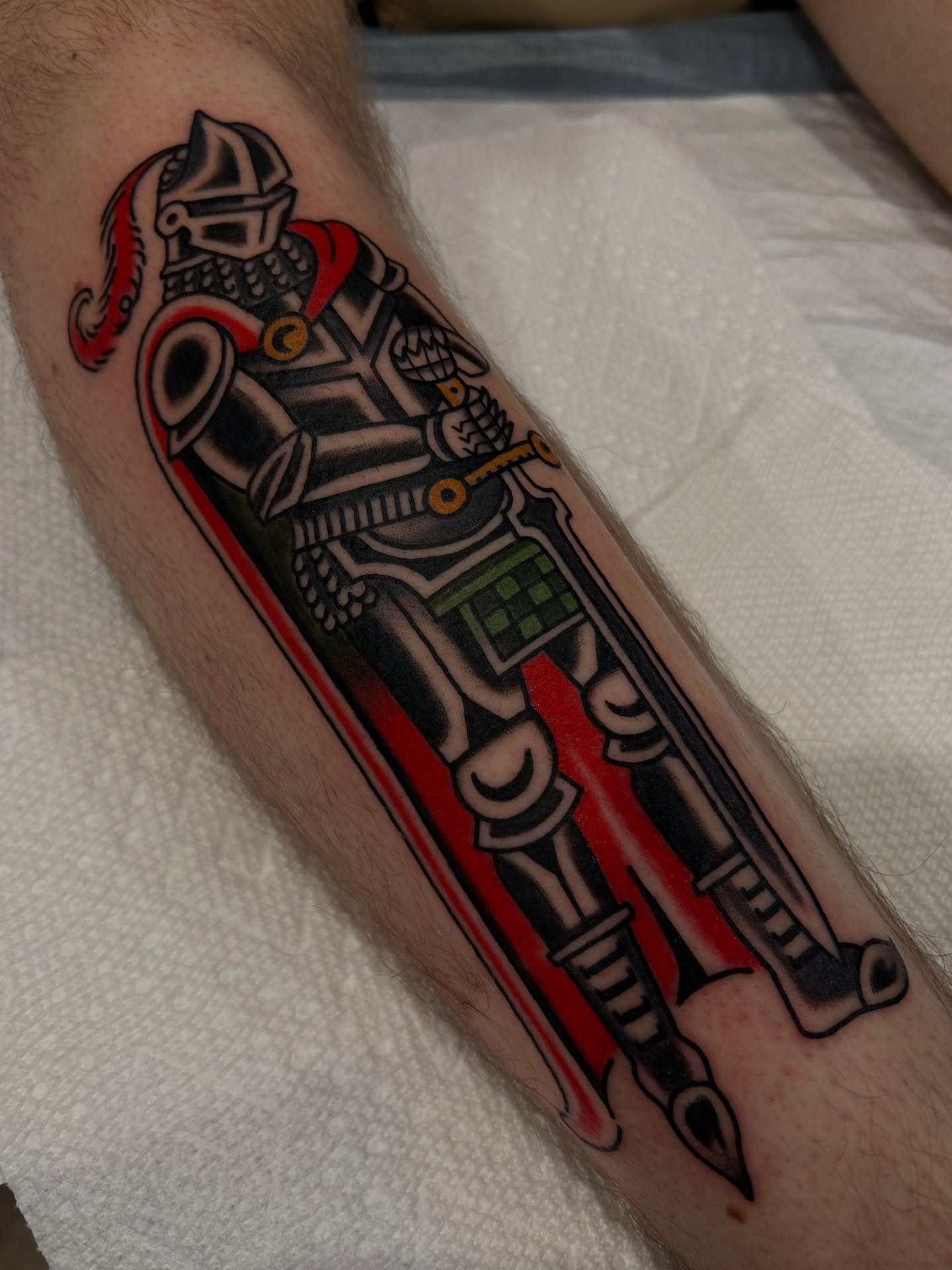 Medieval knight American traditional tattoo on the forearm by Lilly Binns