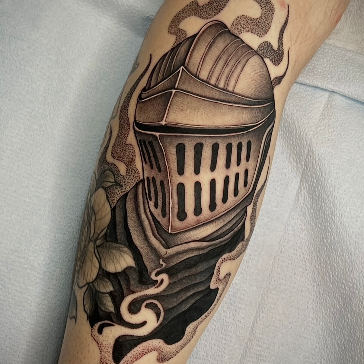 Helmet dotwork tattoo on the forearm by Mia Manzanedo