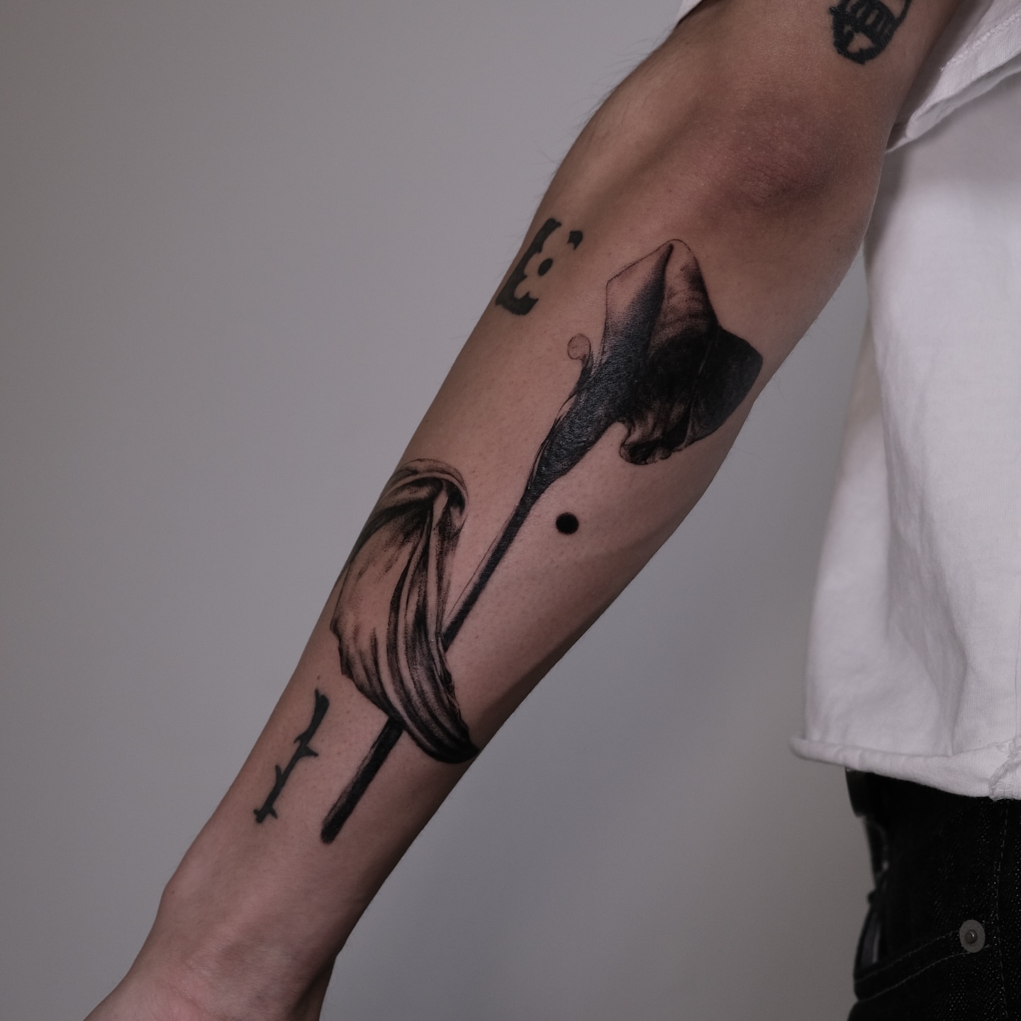 Calla lily realism tattoo on the forearm by Mané, Portland, Oregon