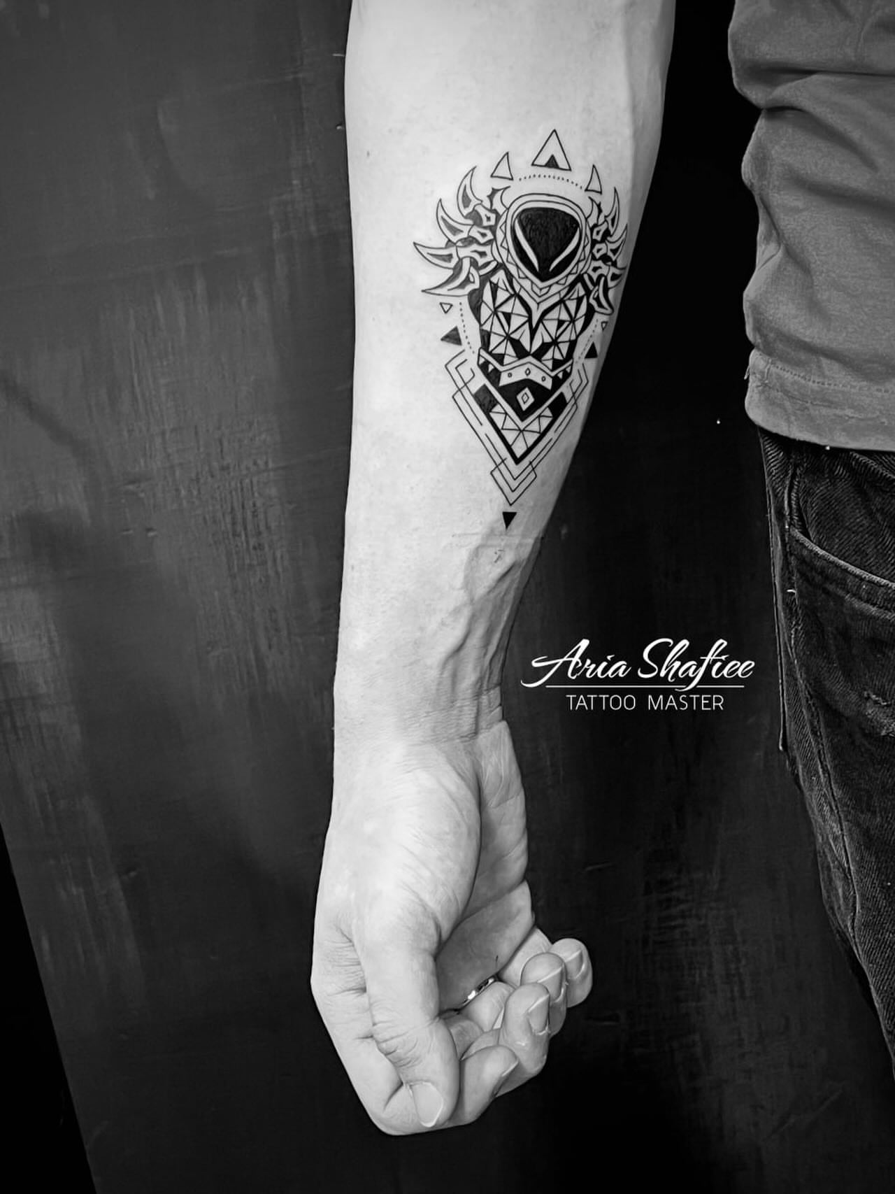 Geometric design geometric tattoo on the forearm by Aria Shafiee