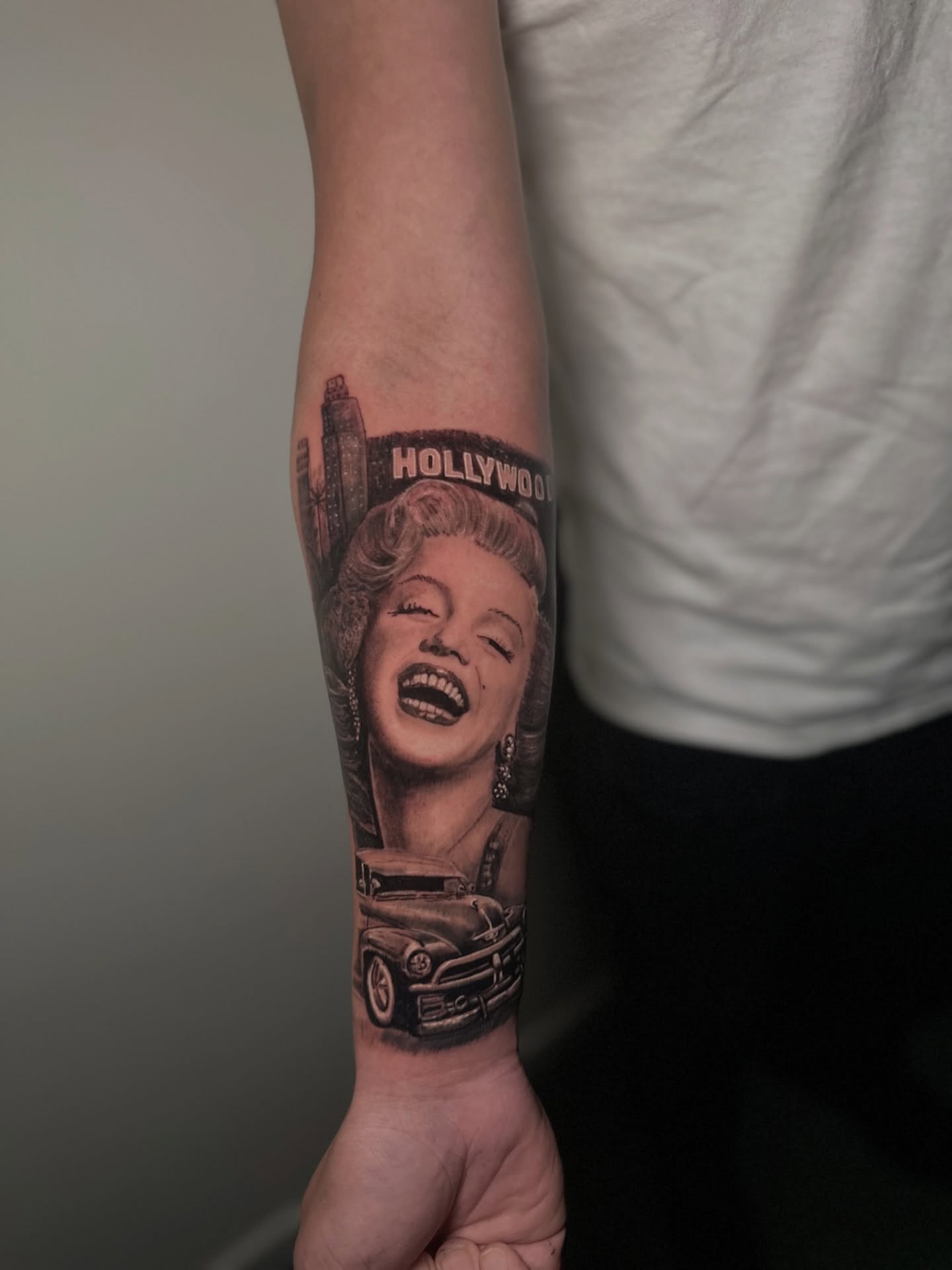 Hollywood realism tattoo on the forearm by Héctor Agudelo