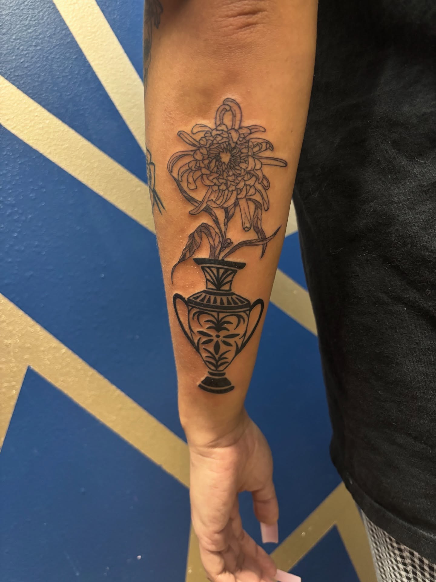 Flower in vase black and grey tattoo on the forearm by ✨Cyerra Lynne✨