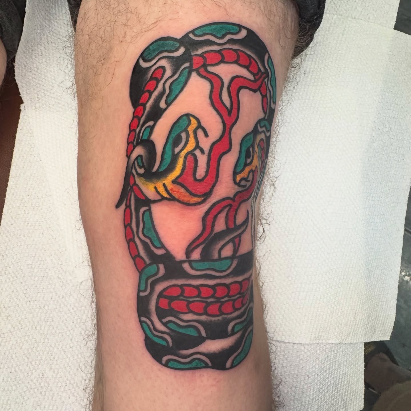 Skull American traditional tattoo on the forearm by Kenny Kastro
