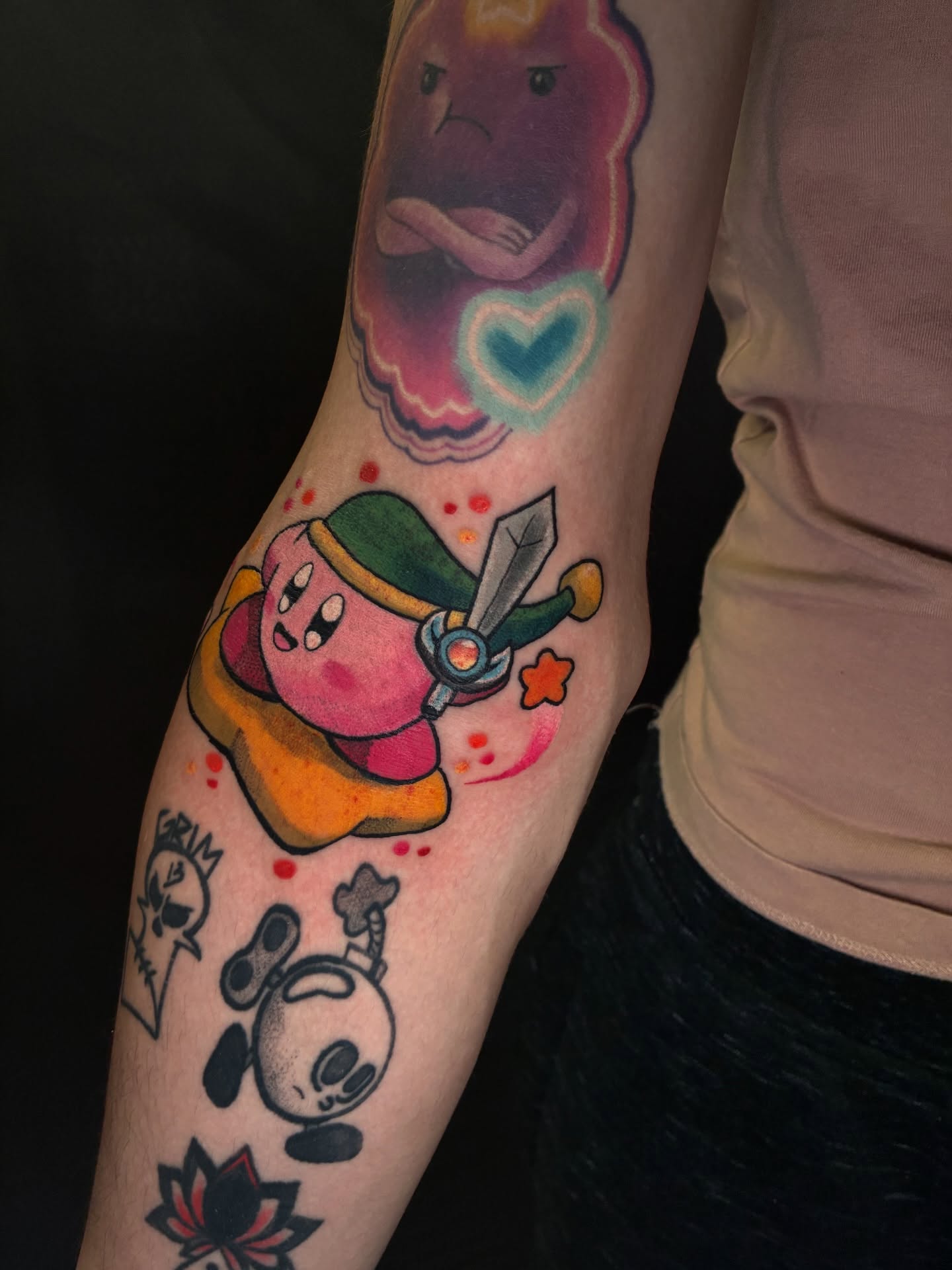 Kirby new school tattoo on the forearm by Colton🎨