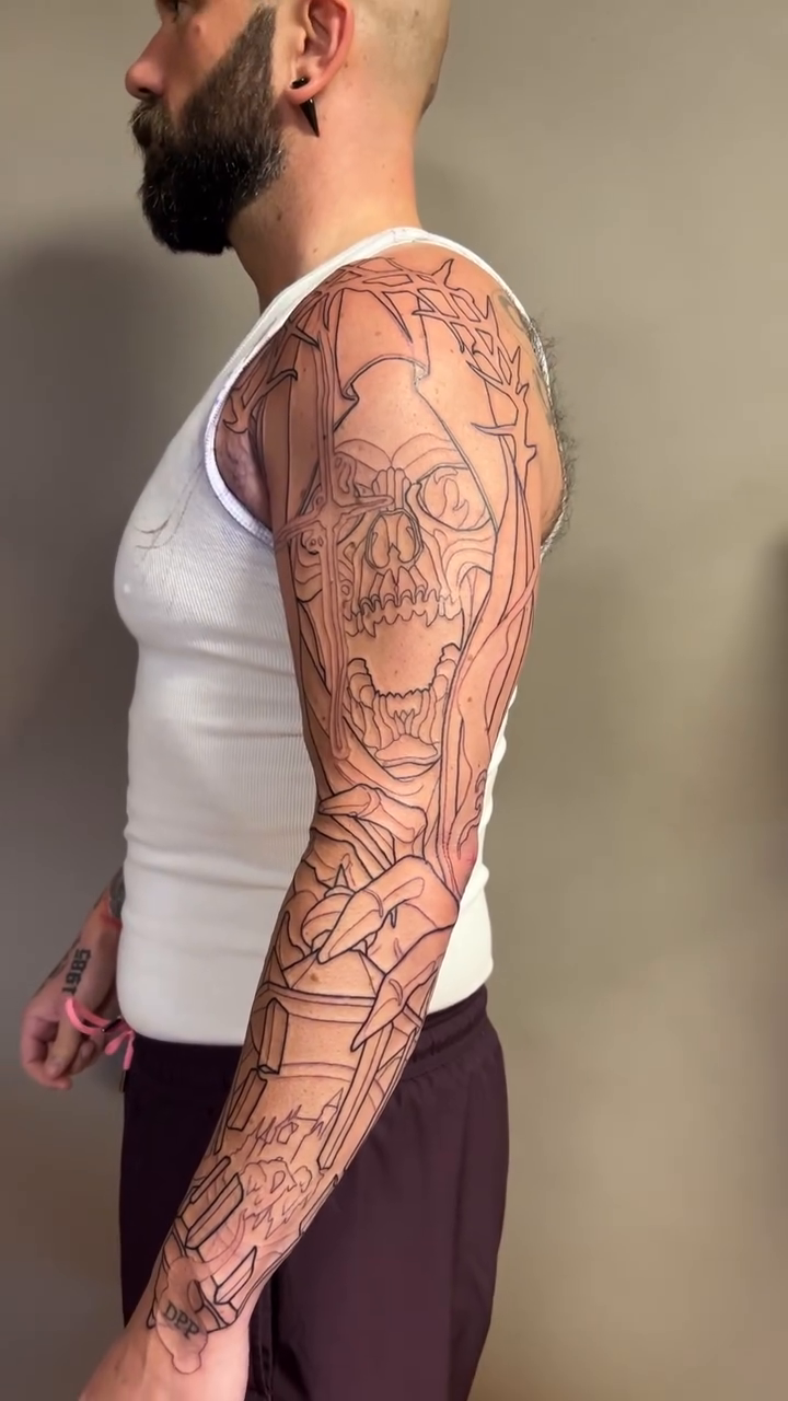 Grim Reaper with lantern realism tattoo on the upper arm by Brandon Michael