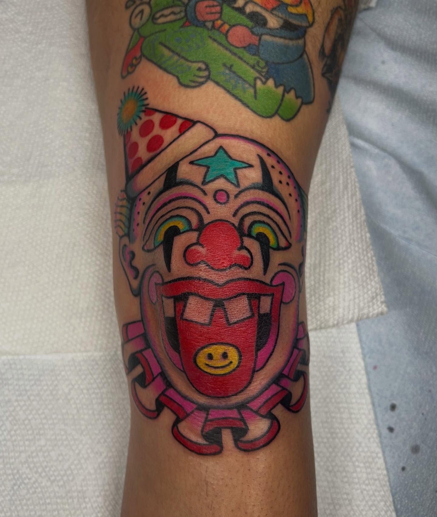 Clown mask American traditional tattoo on the forearm by ☻ darby robertson ☻