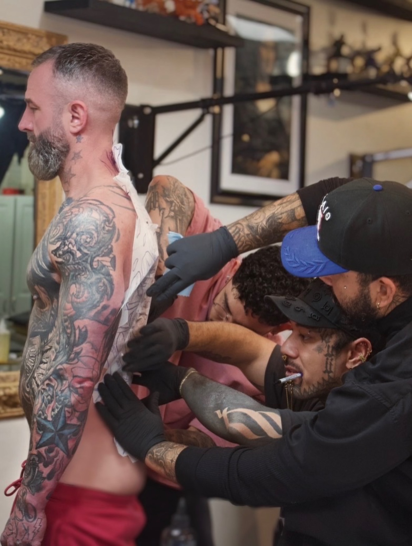 Tattoo artist working American traditional tattoo on the torso by Moi Rivas, Salt Lake City, Utah