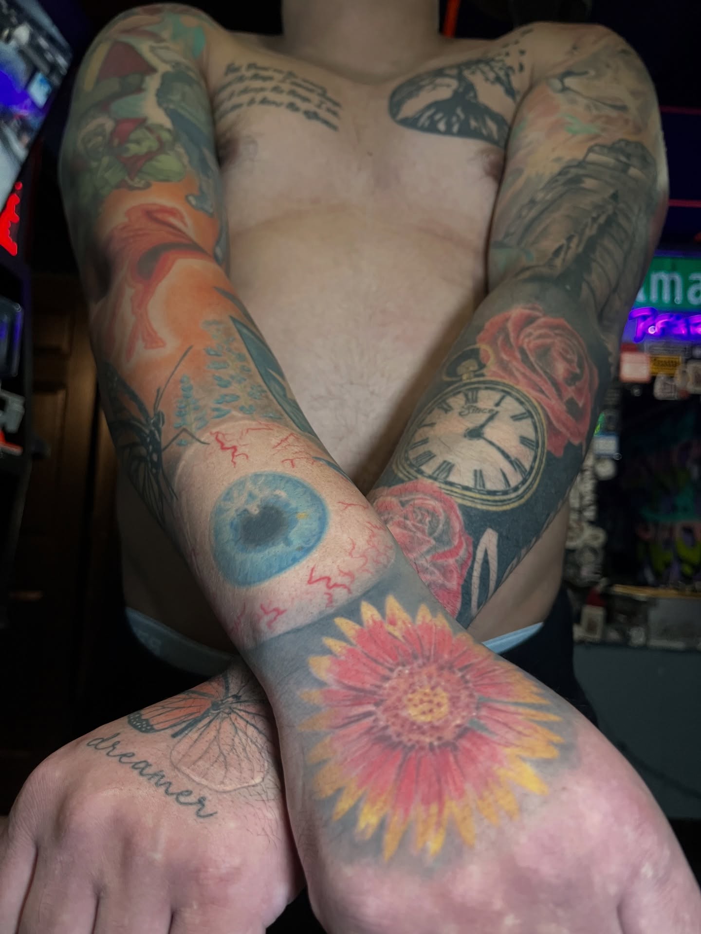 Flower and clock American traditional tattoo on the forearm by Abel Ponce