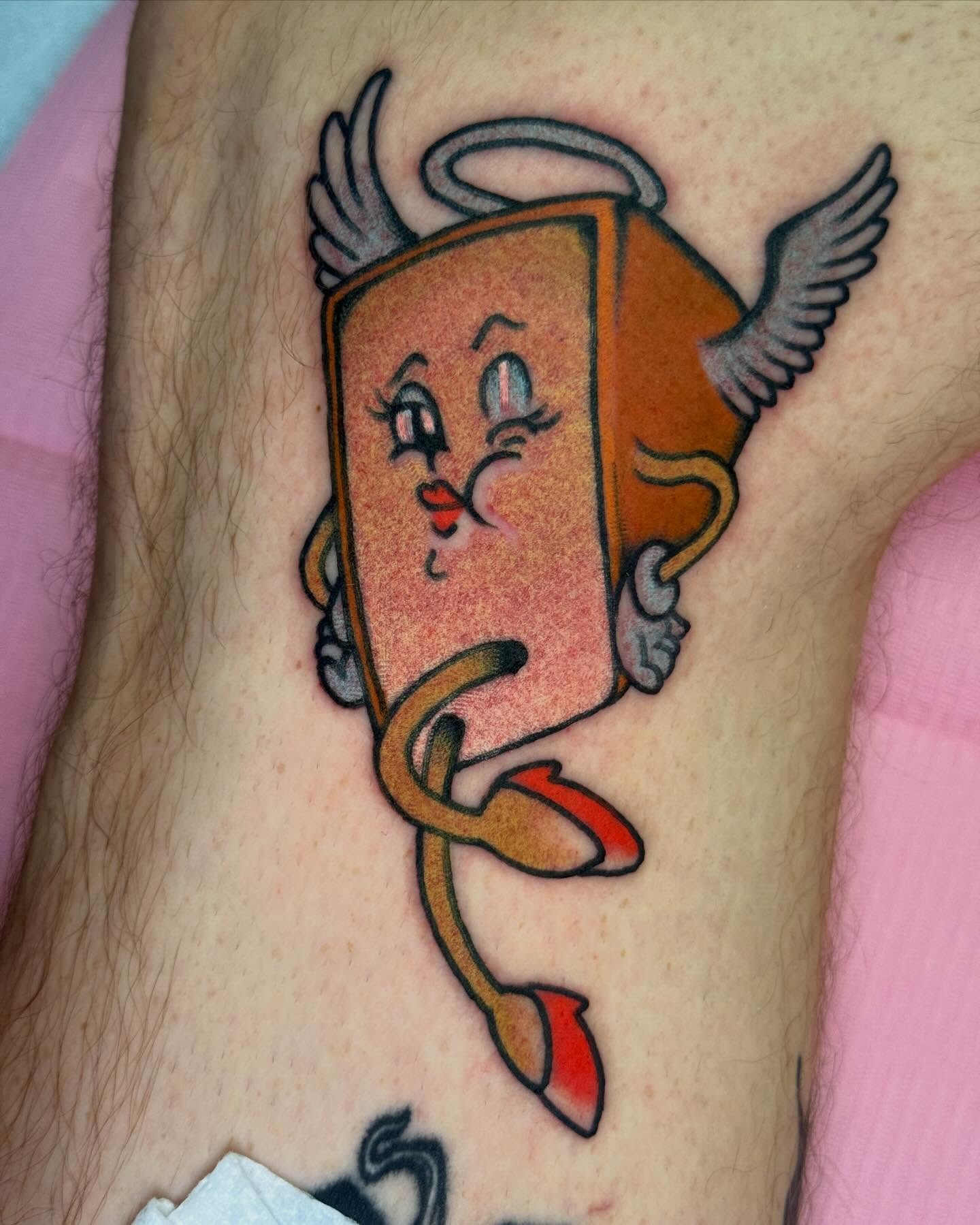 Angel toast American traditional tattoo on the forearm by Cassie O'Neal DeBord