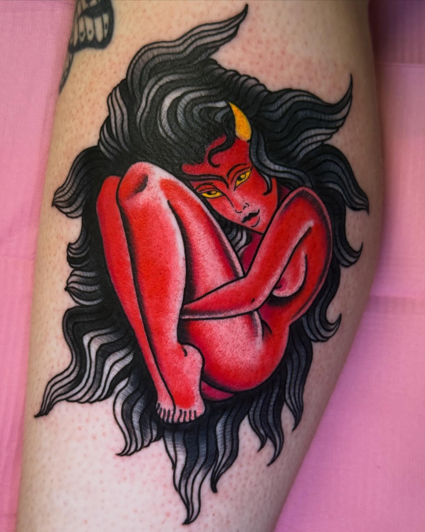Red devil woman American traditional tattoo on the thigh by Cassie O'Neal DeBord