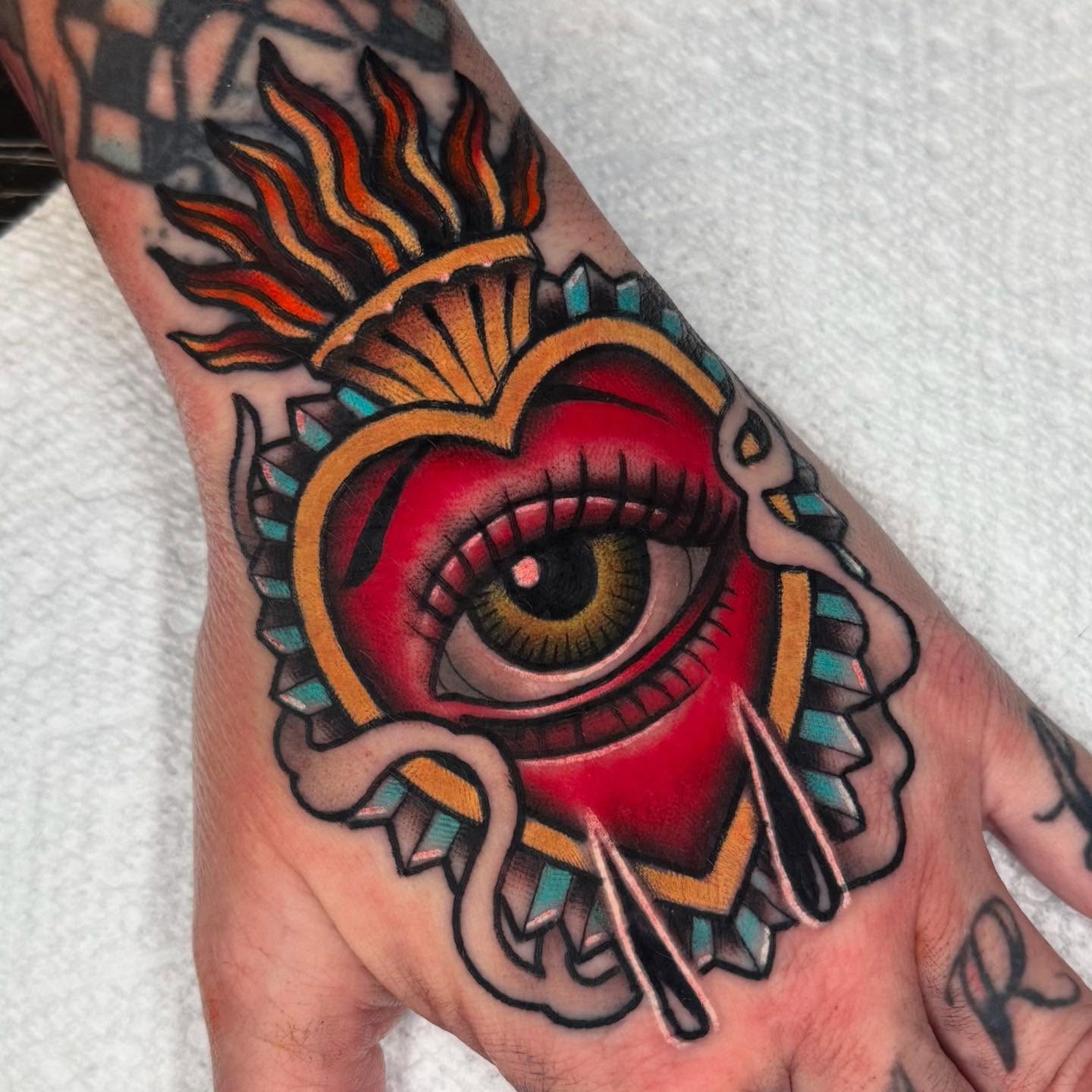 Eye American traditional tattoo on the hand by Graham Edward Vogel
