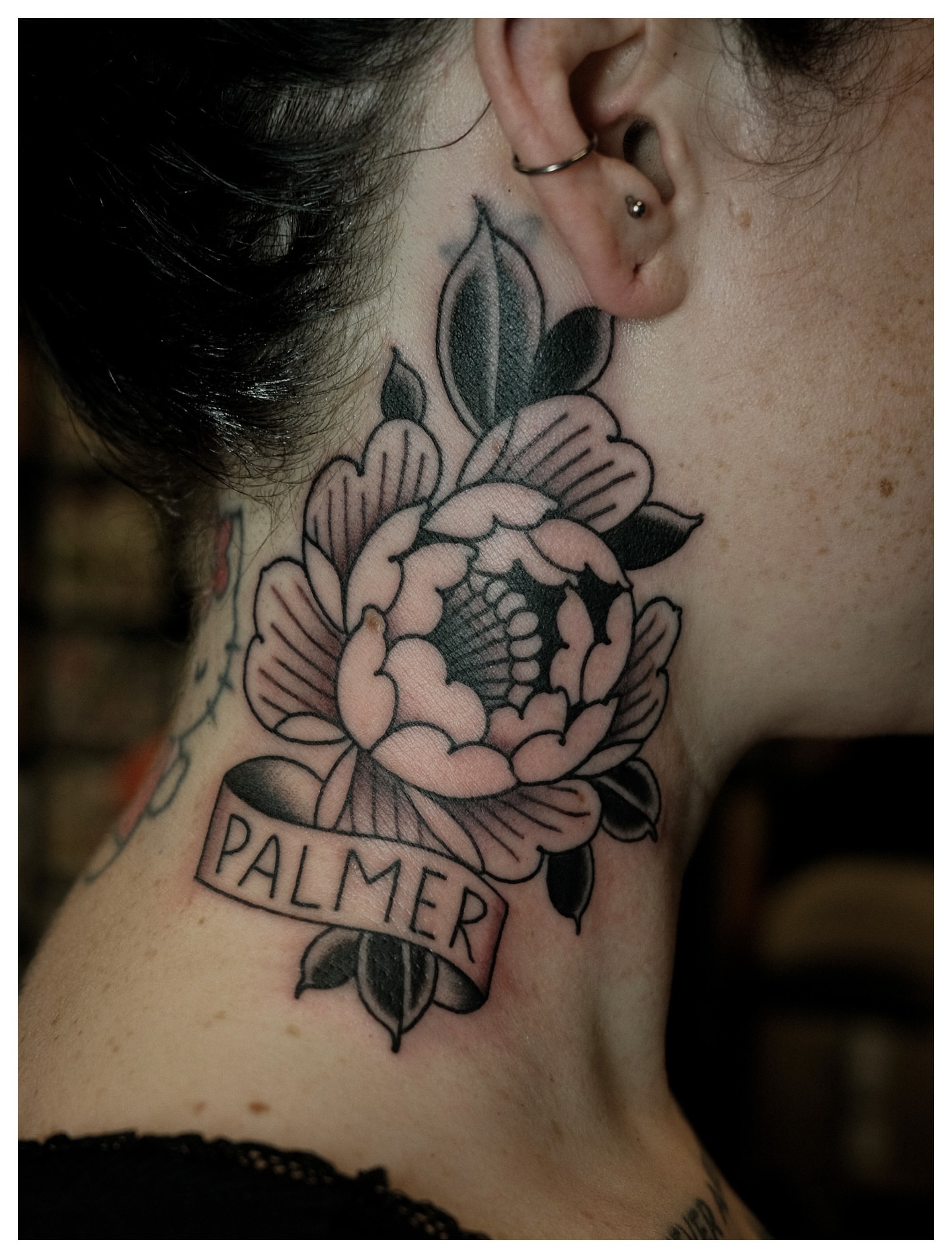 Peony flower American traditional tattoo on the neck by Tony Talbert, Fredericksburg, Virginia