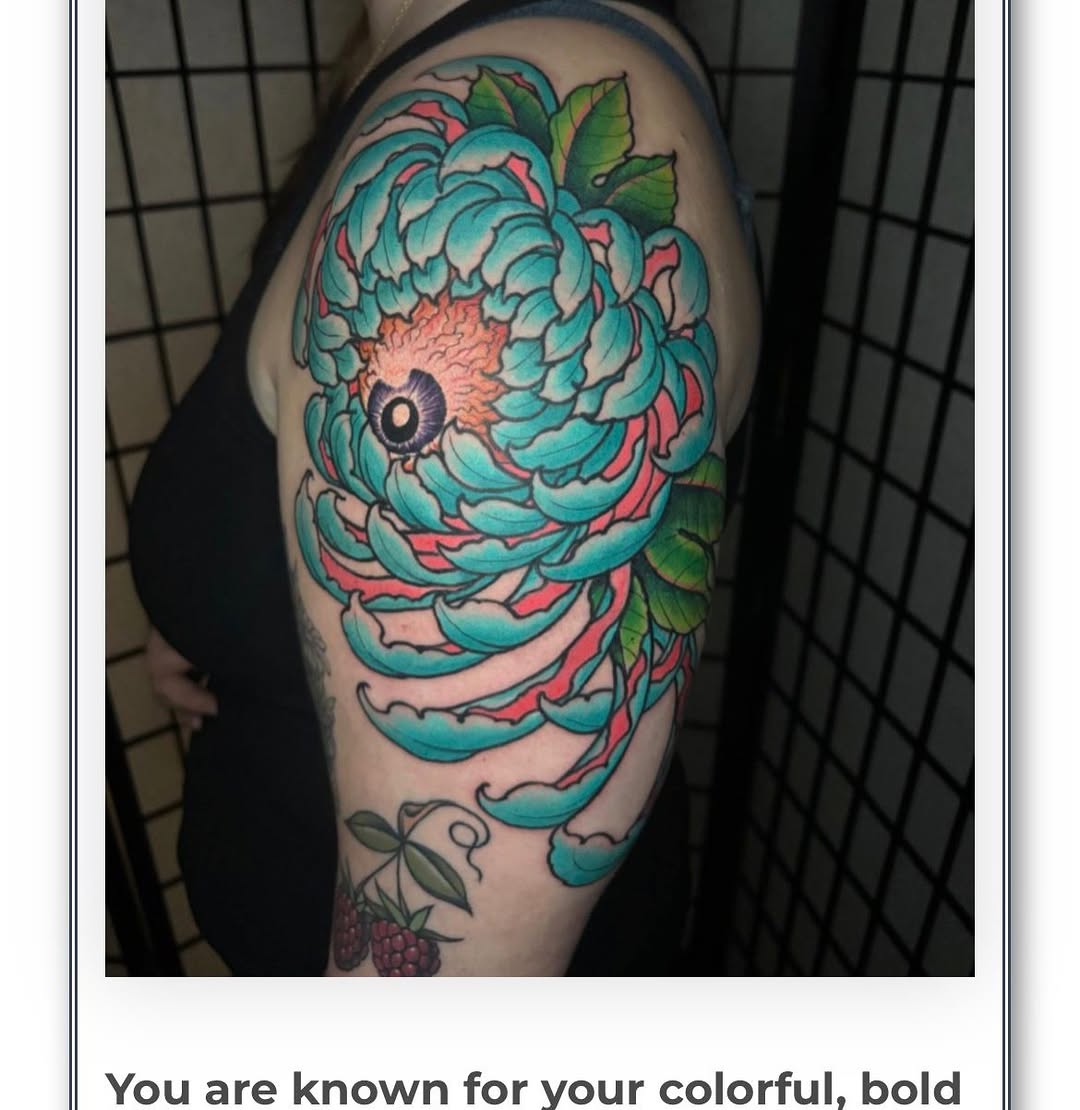 Flower with eye neo-traditional tattoo on the upper arm by 𝙉𝙄𝘾𝙆 𝘾𝘼𝙍𝙐𝙎𝙊, New York, New York