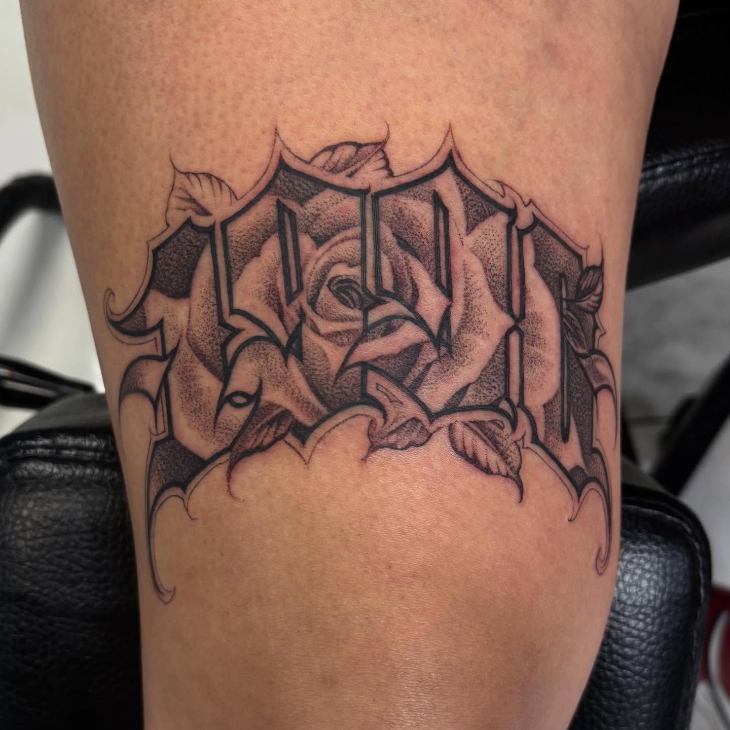 Rose and gothic shield geometric tattoo on the forearm by Ashley brown, Las Vegas, Nevada