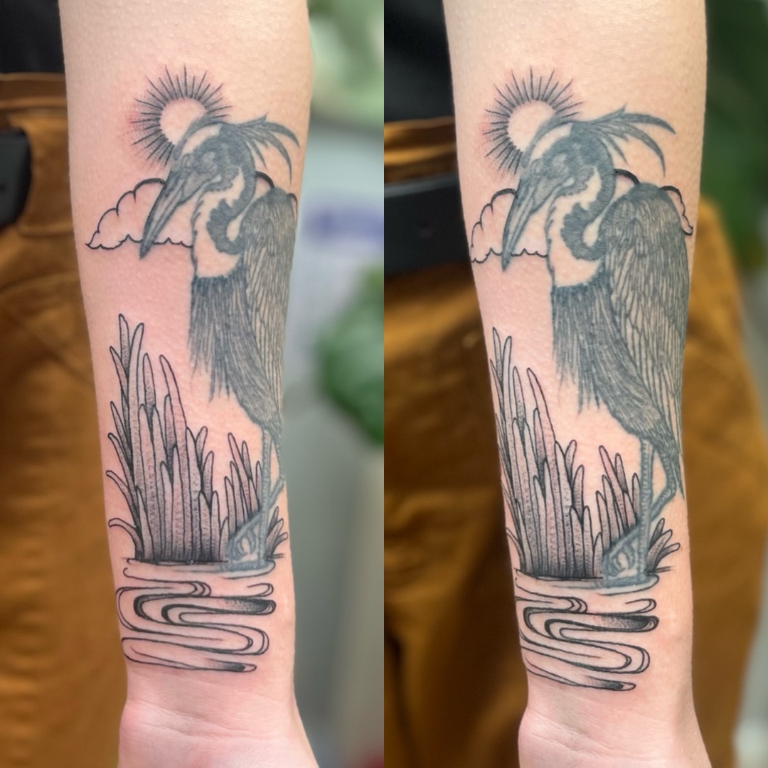 Heron black and grey tattoo on the forearm by Garden Glow Tattoo