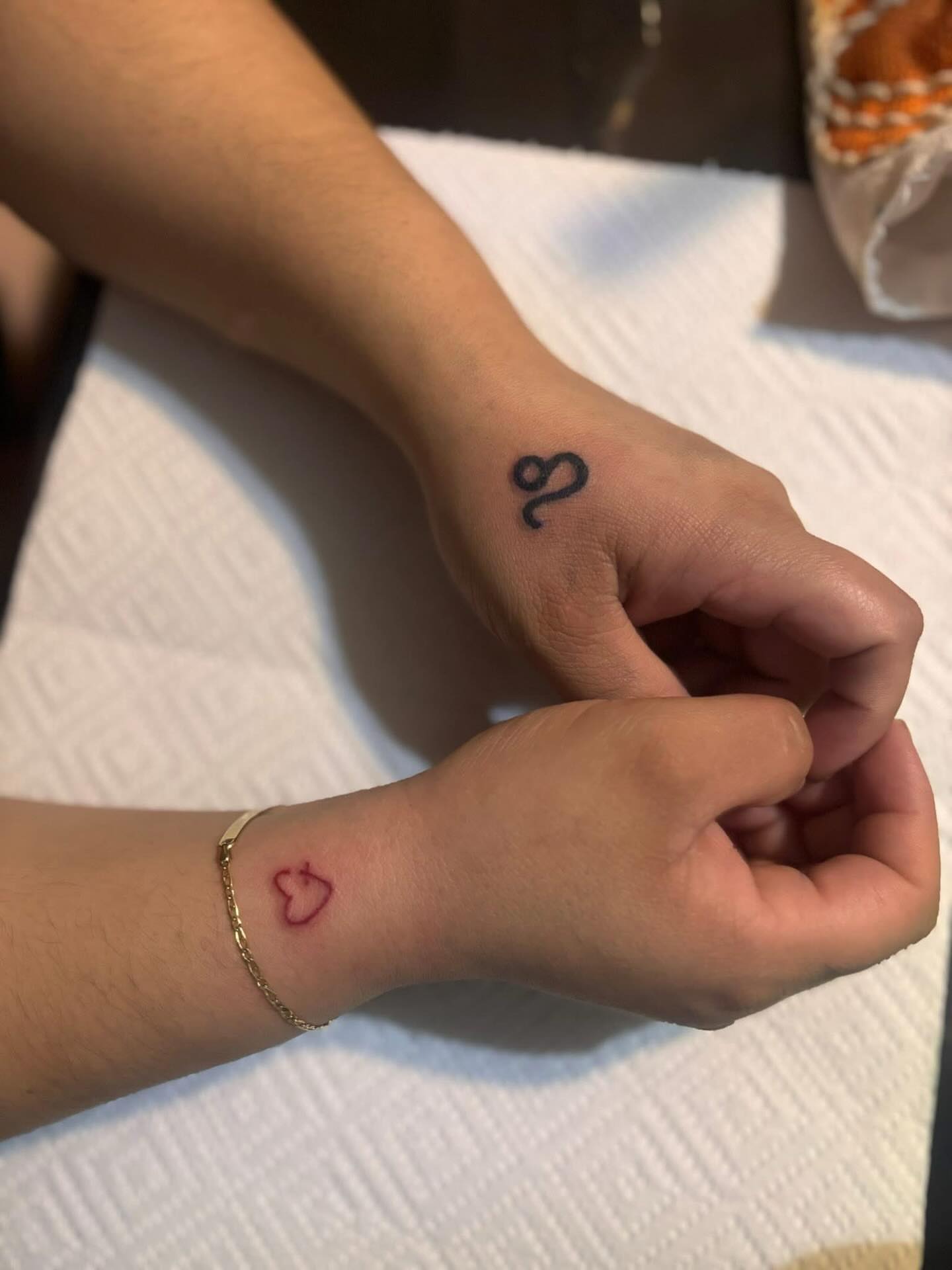 Cancer symbol black and grey tattoo on the forearm by Ana Uriarte π