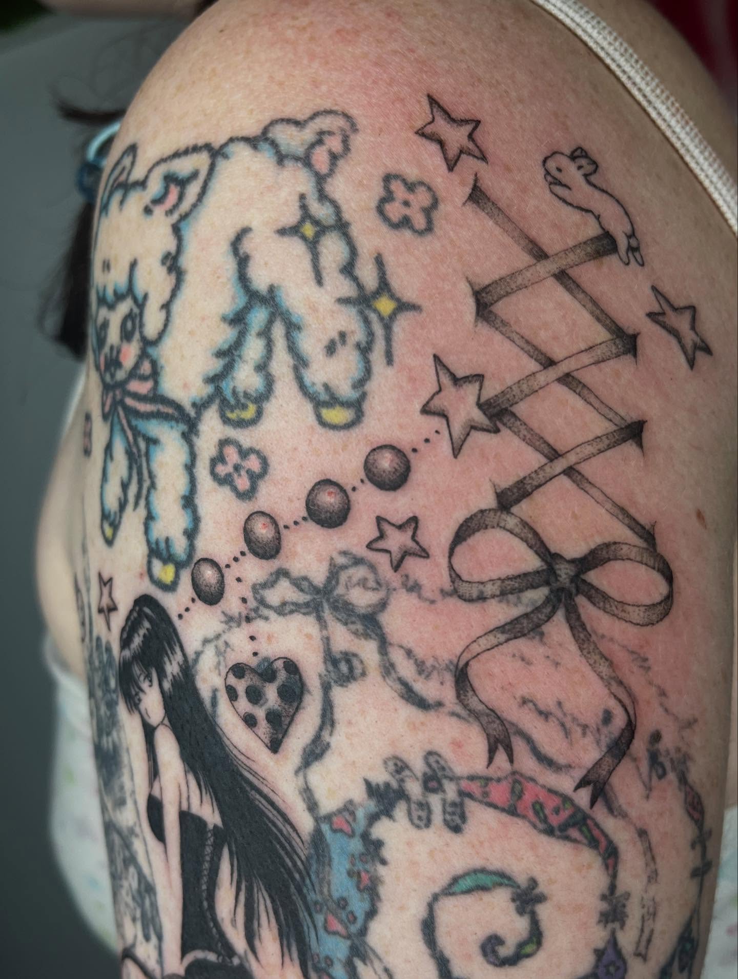 Sheep and stars American traditional tattoo on the shoulder by Gabbie