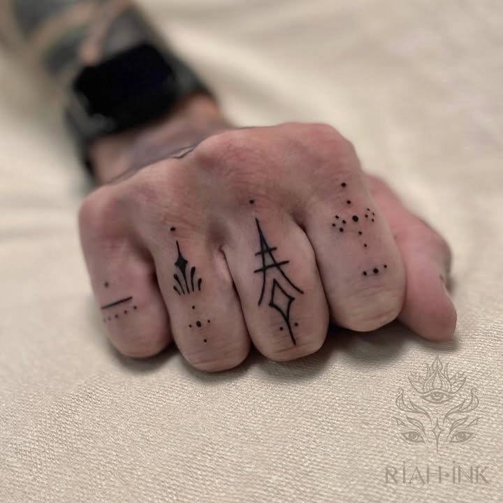 Geometric symbols ornamental tattoo on the hand by Nils Bashirian
