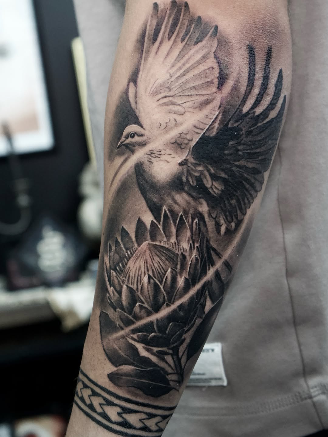 Tattoo by @kaostattooart — realism, black_and_grey