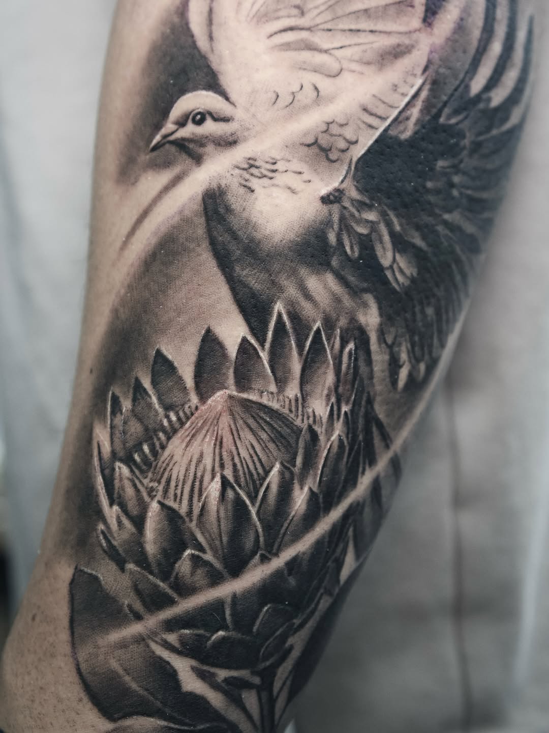 Tattoo by @kaostattooart — realism, black_and_grey