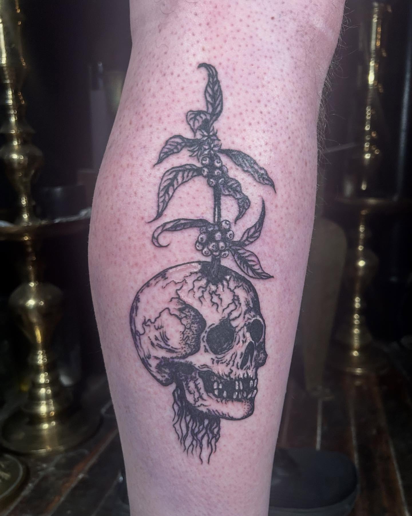 Skull with plant realism tattoo on the forearm by ๐๐๐๐๐๐ ๐๐๐๐๐๐ ๐๐๐๐๐๐