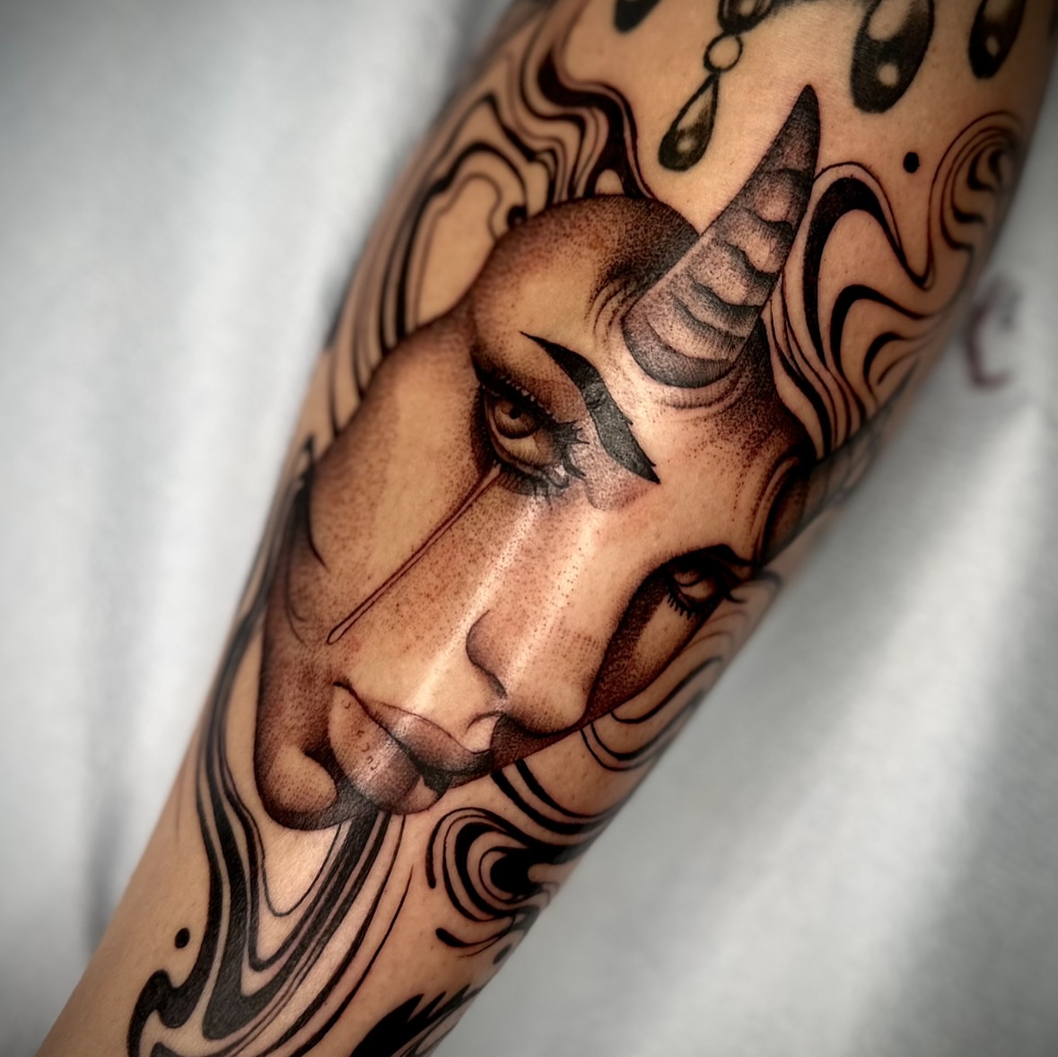 Unicorn realism tattoo on the forearm by Feliz Manzanedo, Prescott, Arizona