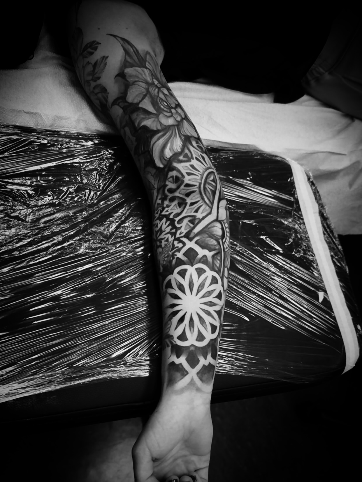 Geometric mandala geometric tattoo on the forearm by Julian Olson