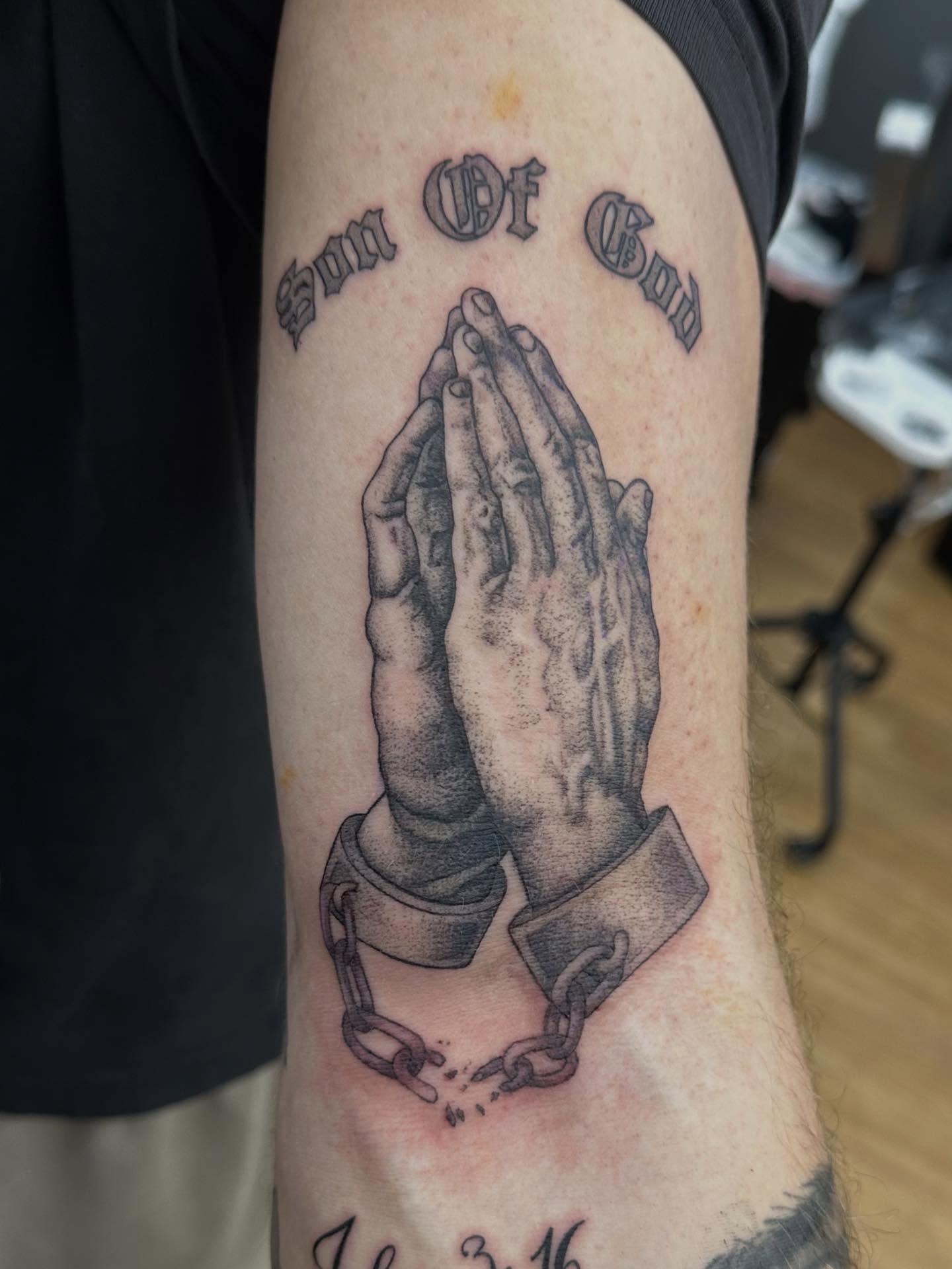 Praying hands dotwork tattoo on the forearm by Jack