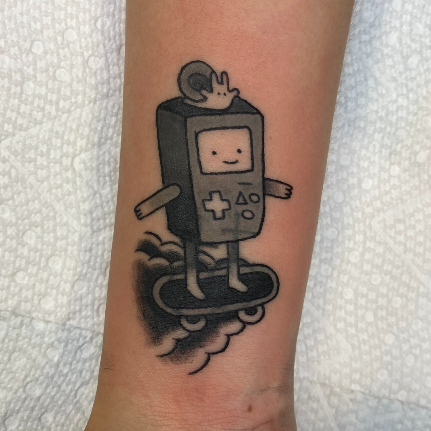 BMO black and grey tattoo on the forearm by maddie mcghee, Memphis, Tennessee