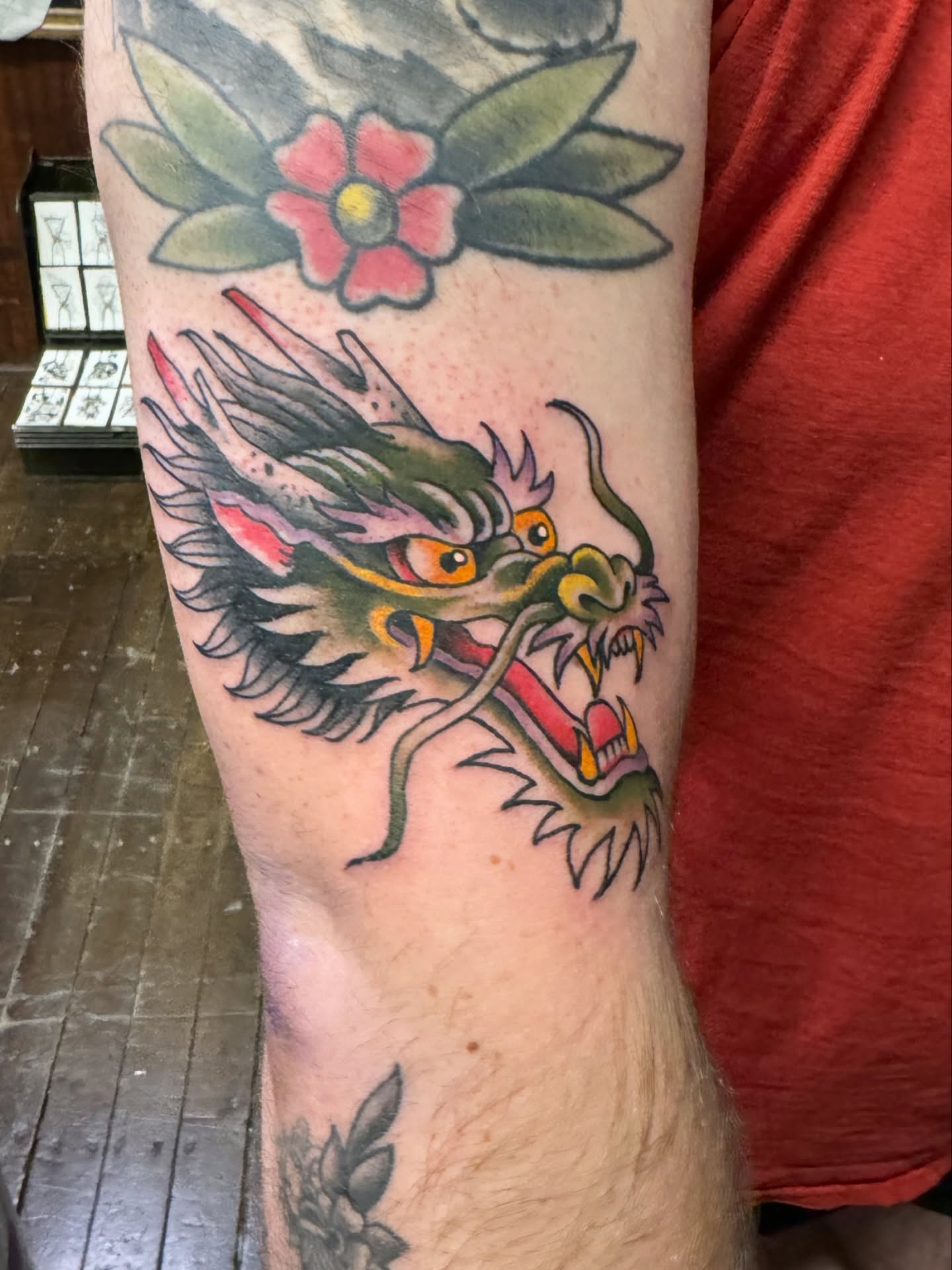 Dragon head American traditional tattoo on the forearm by Marc Brotemarkle