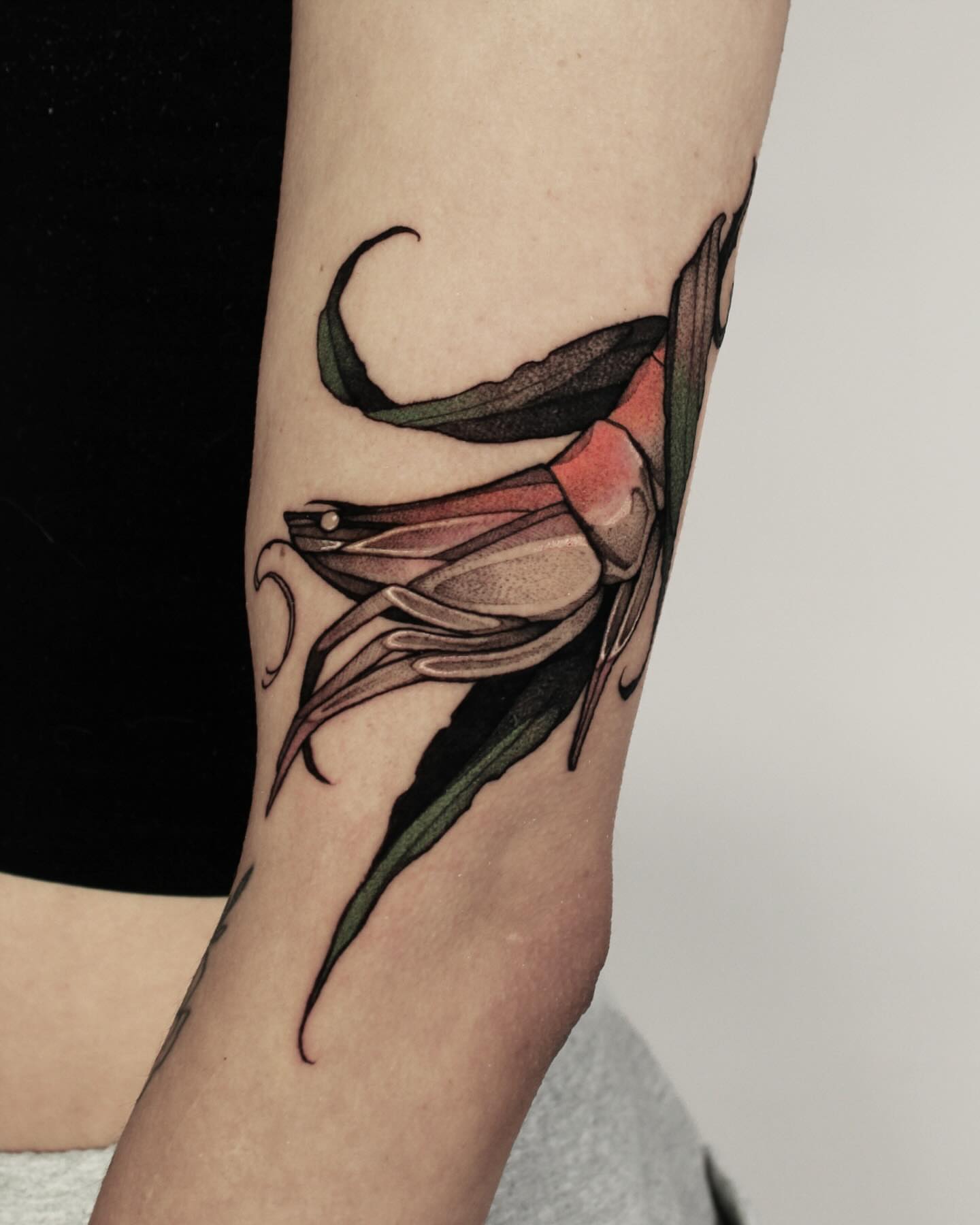 Abstract floral watercolor tattoo on the forearm by Heather Apgar