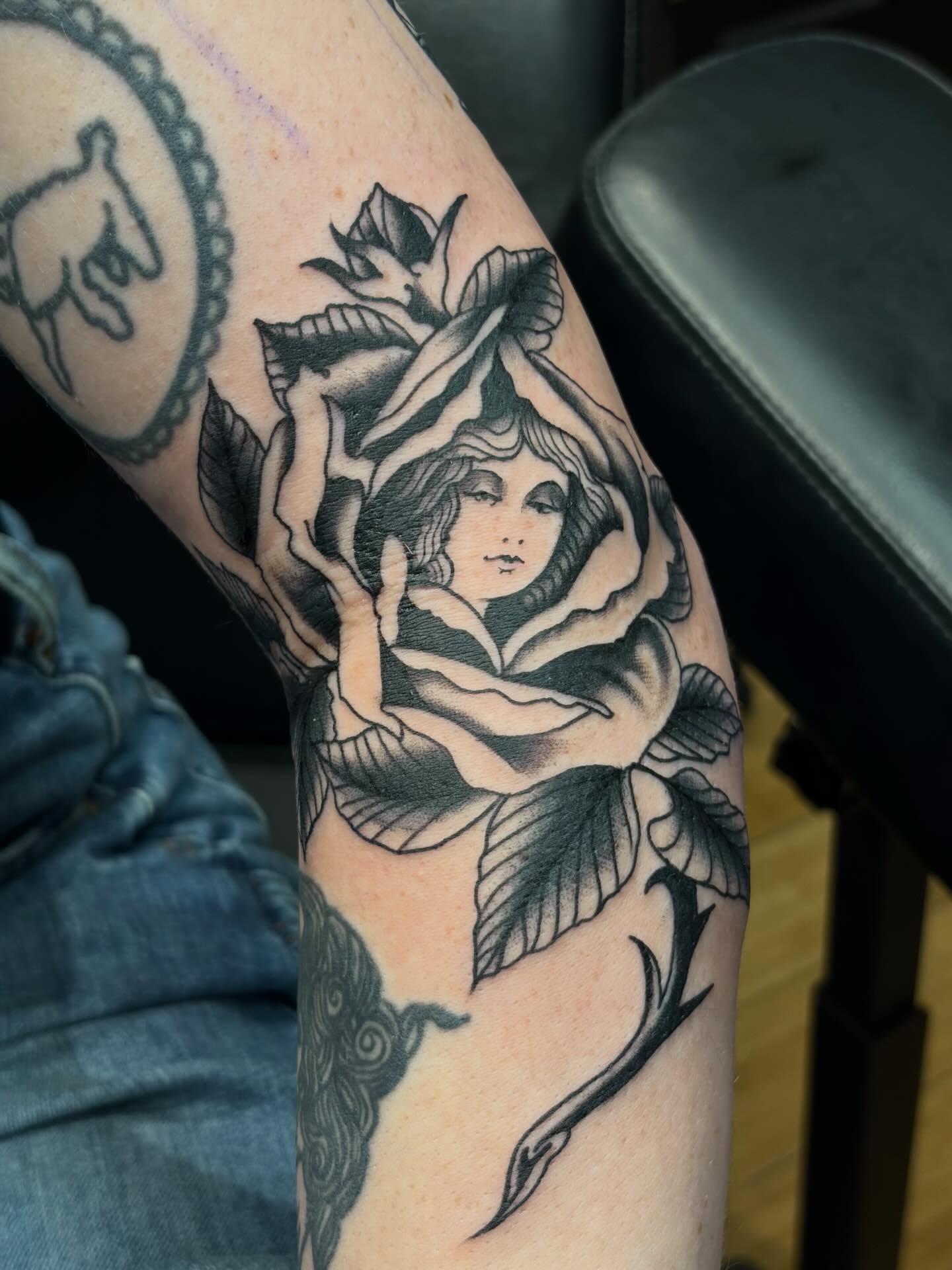 Rose with woman American traditional tattoo on the forearm by Joe Khay, Hackettstown, New Jersey