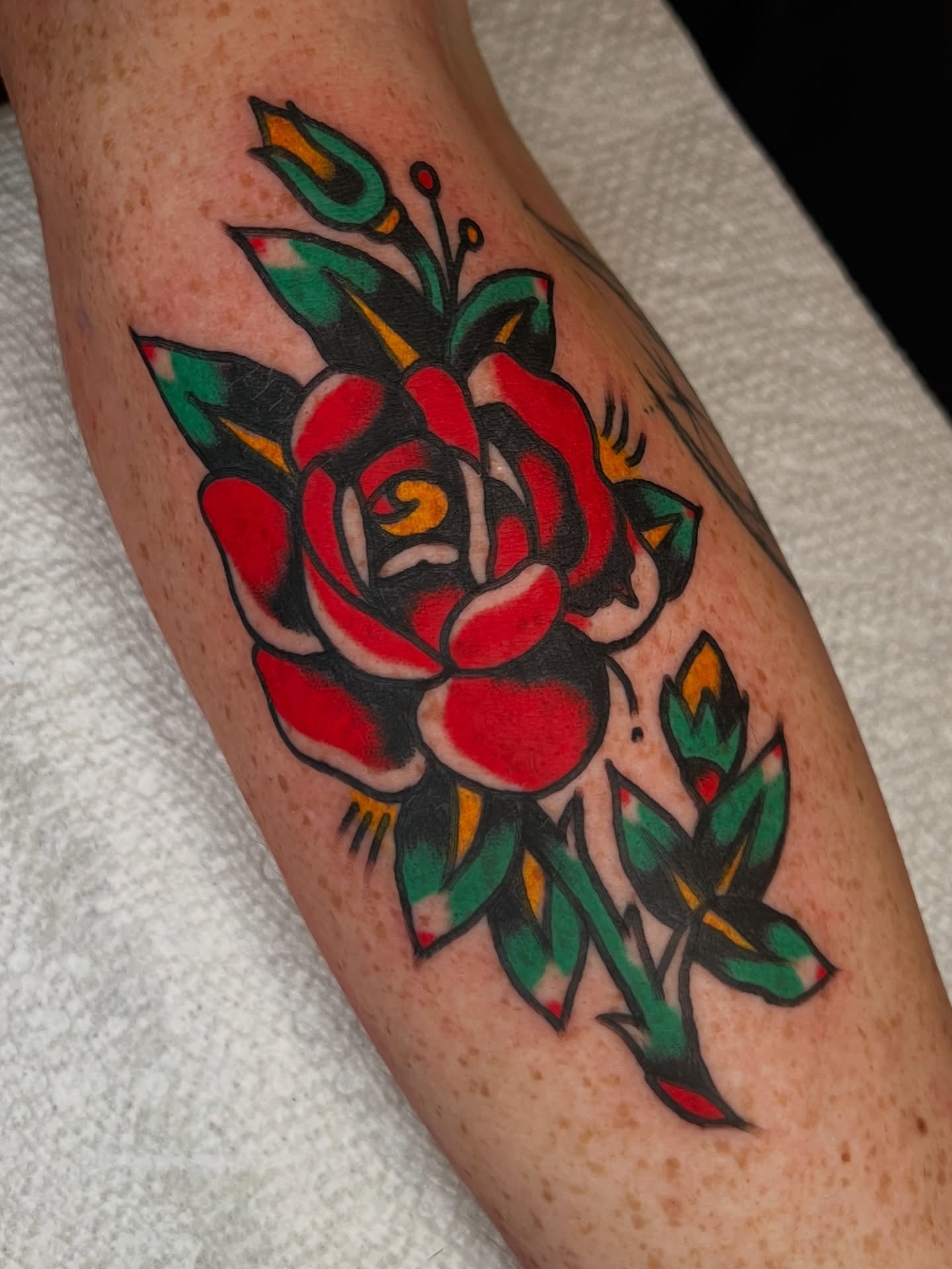 Rose American traditional tattoo on the forearm by 💥Jeff Klug💥, Austin, Texas