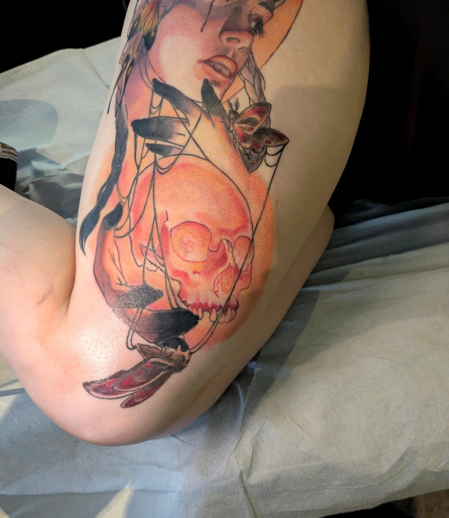 Woman with skull realism tattoo on the thigh by Lahel (Lay-el) Fowler