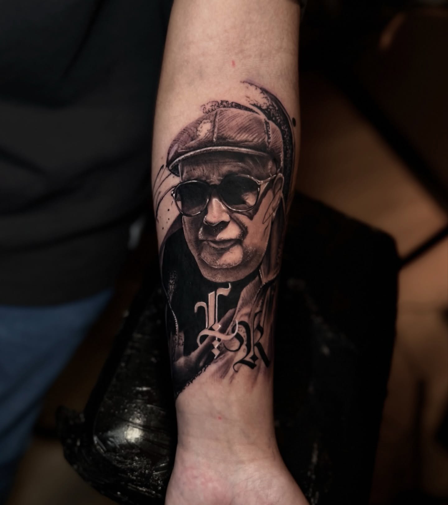 Portrait realism tattoo on the forearm by Sebastian Calderon