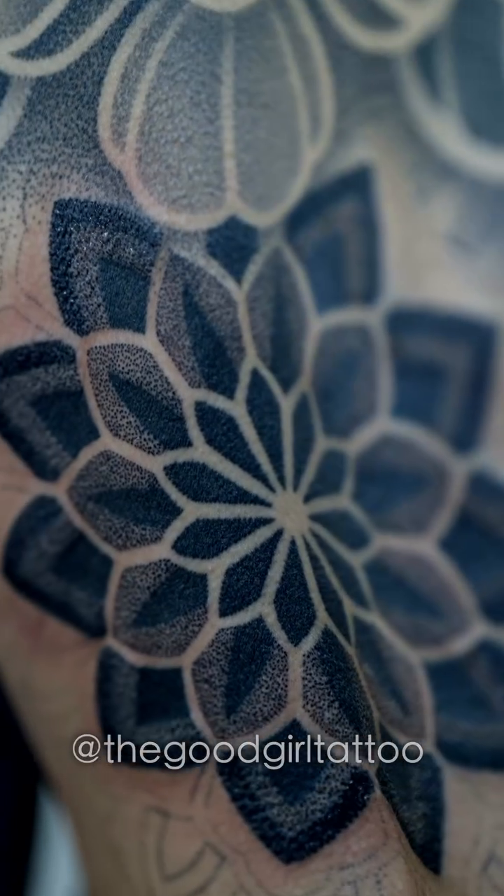Geometric flower dotwork tattoo by Marvin Silva