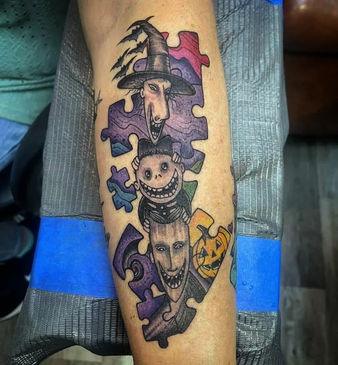 Puzzle pieces dotwork tattoo on the forearm by Josh Sroga