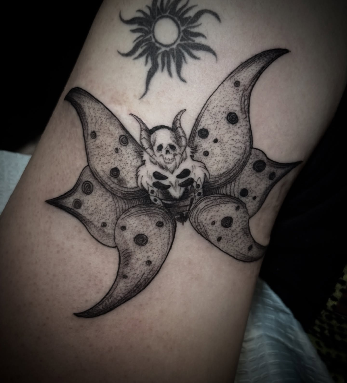 Skull with wings dotwork tattoo on the forearm by † Aileen † Chicago Tattoo Artist